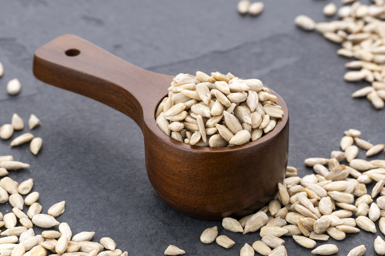 Sunflower seeds in a wooden bowl